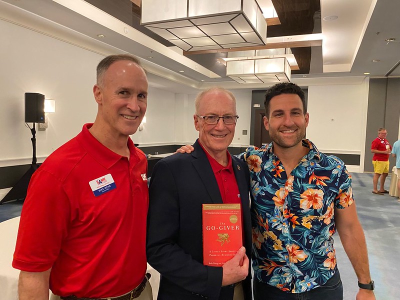 Mike, Joe, guy in hawaiian shirt, book